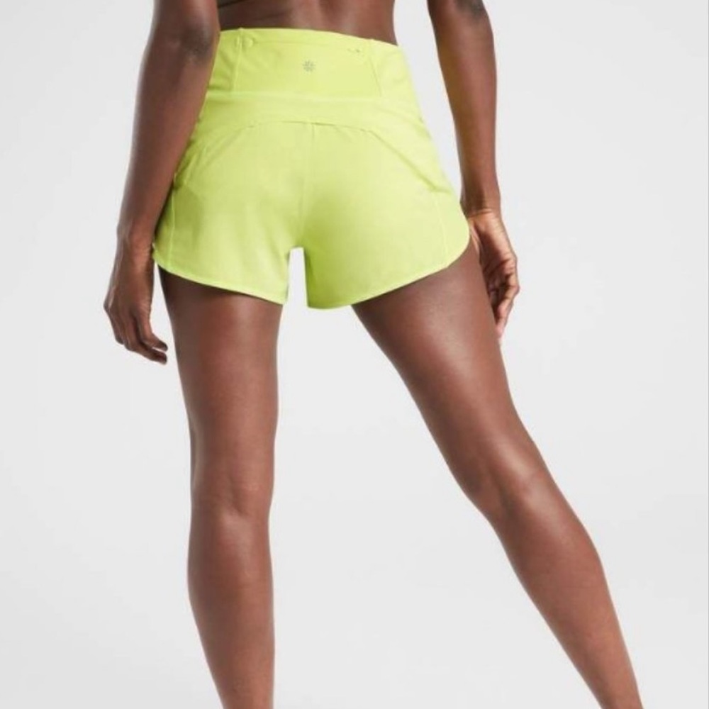 ATHLETA Running Free Shorts Neon Yellow Green Workout Athletic Yoga Size M